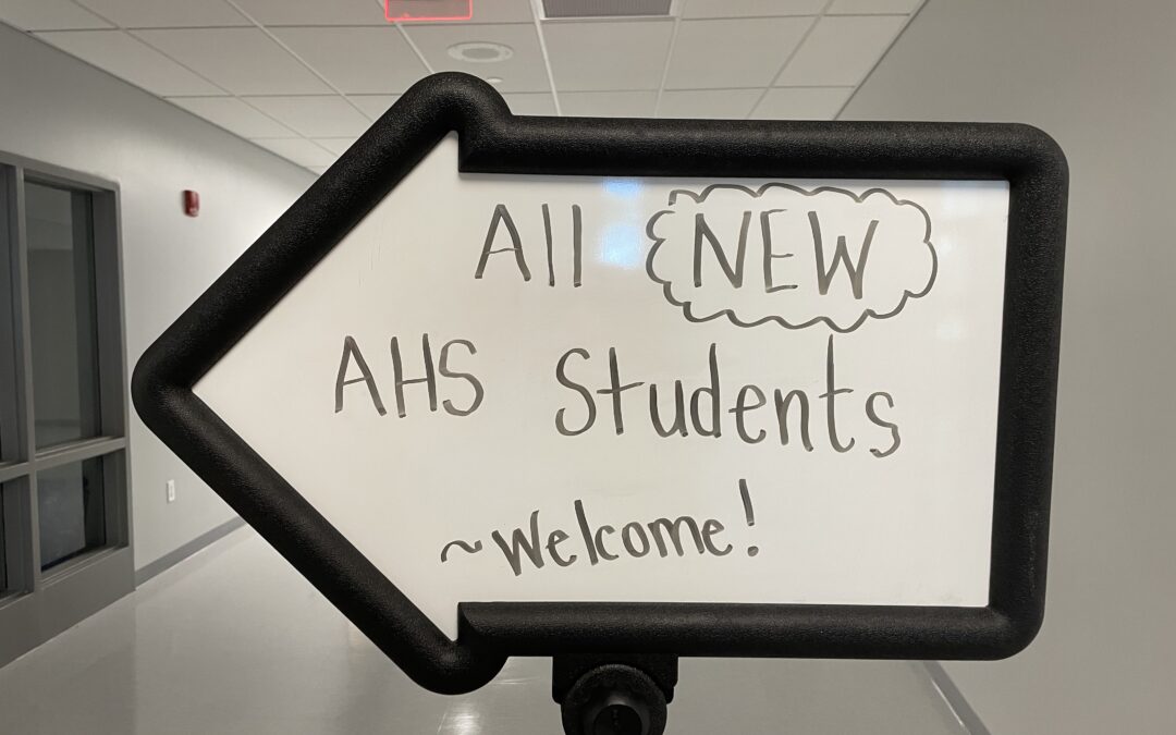 A sign welcoming students back to school