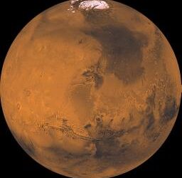 A warming Earth and Martian water